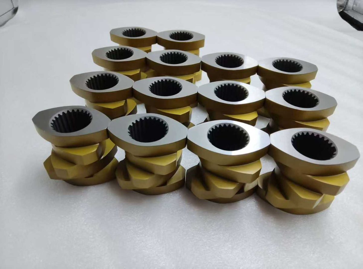 Gold-coated kneading elements for twin-screw extruders